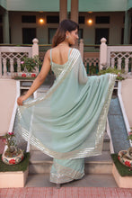 Light green georgette saree