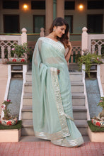 Light green georgette saree