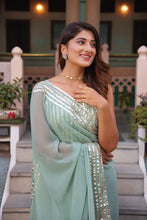 Light green georgette saree